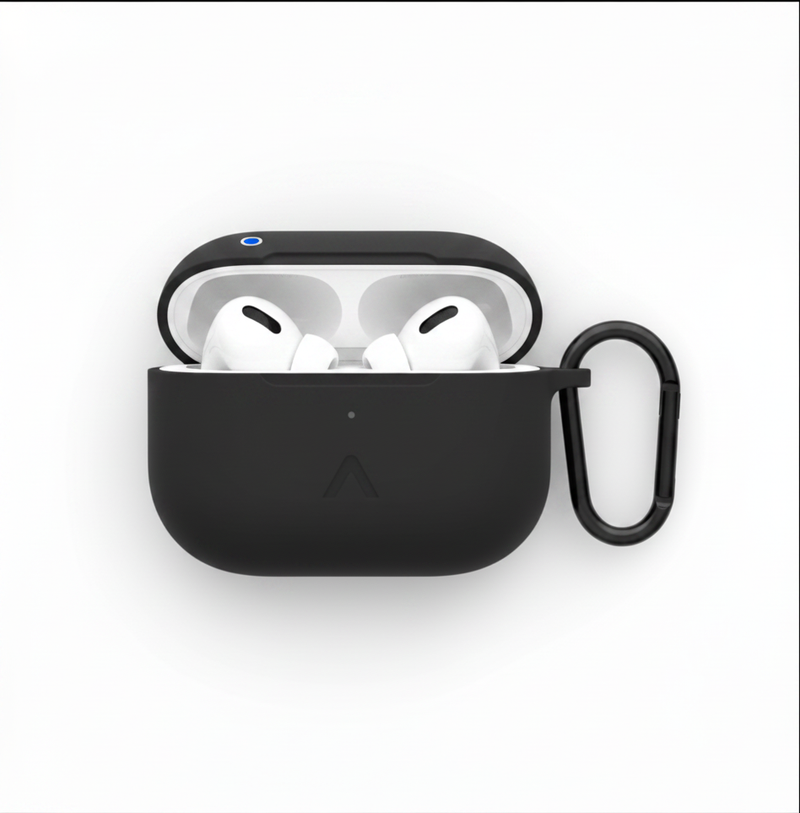 A matte black silicone protective case for an AirPods charging case, shown with the lid open, revealing white AirPods inside. The case features a small embossed triangular logo on the front and a black carabiner clip attached to the right side, all set against a clean white background.